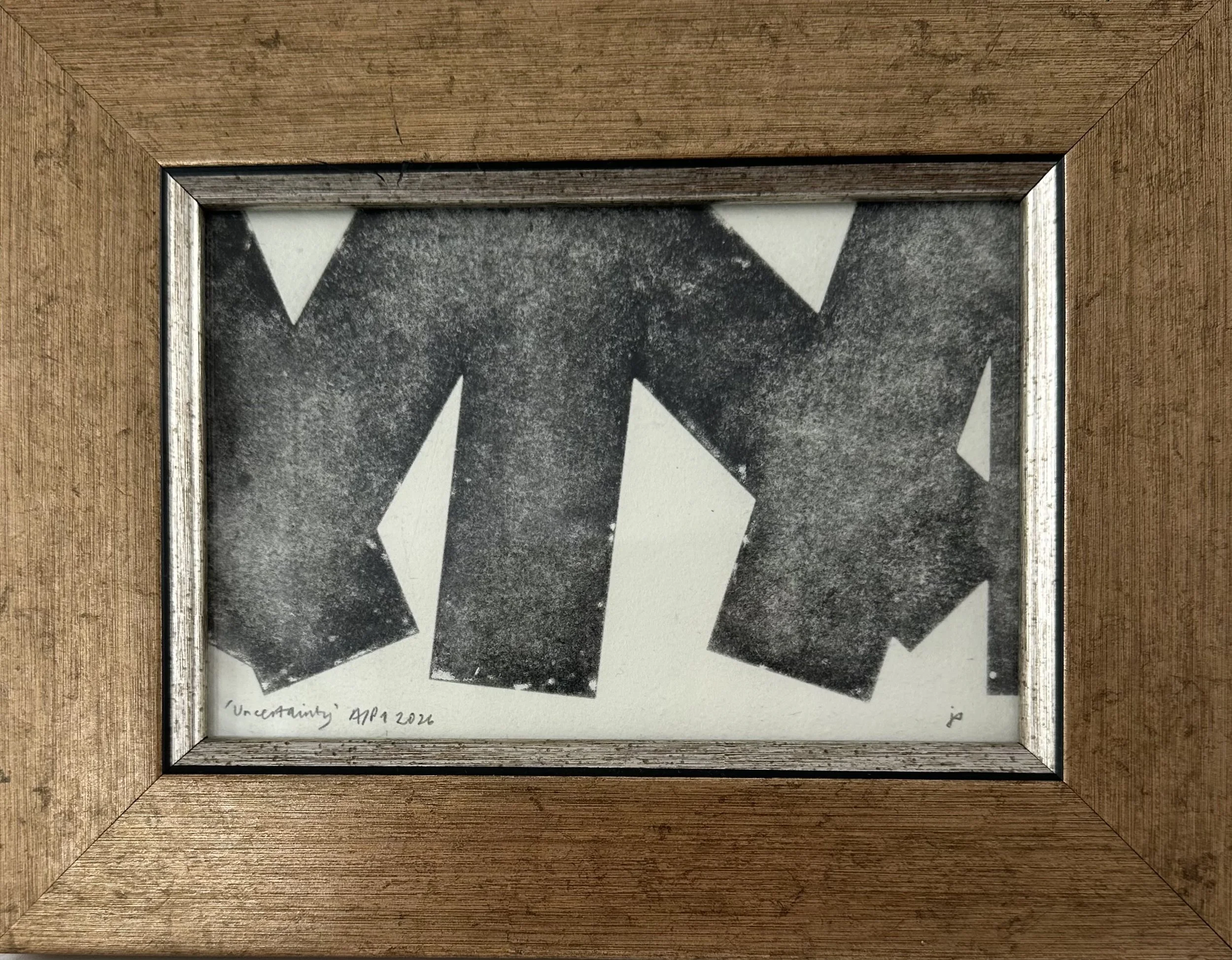 Uncertainty black bars brown frame.jpeg