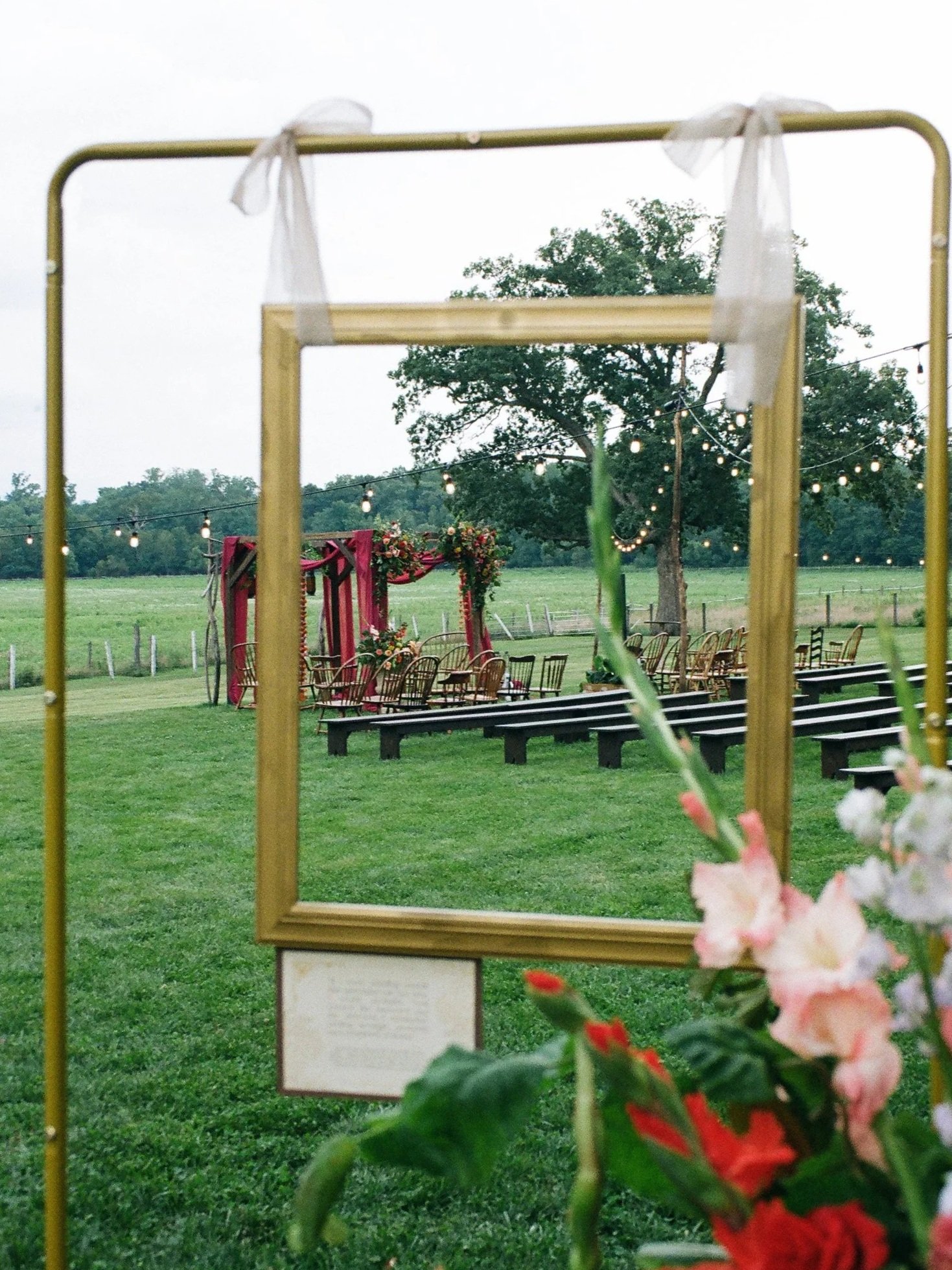Multicultural wedding experiential design detail, custom hanging frame installation by Held Here Consulting