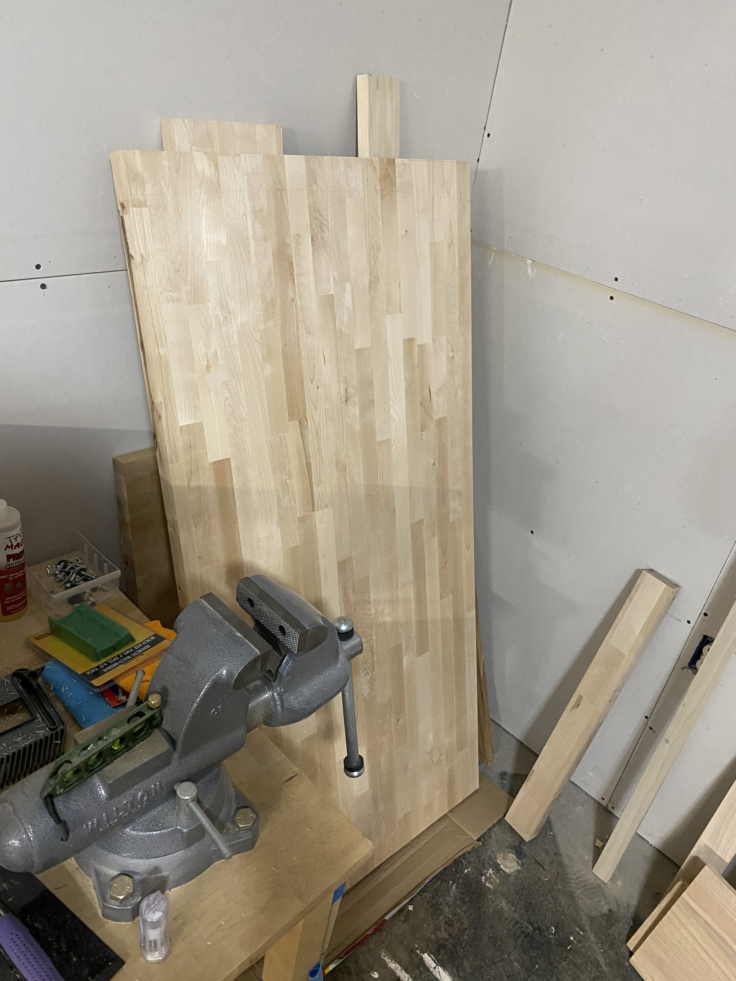 Butcher block table top cut to desired length, waiting for install