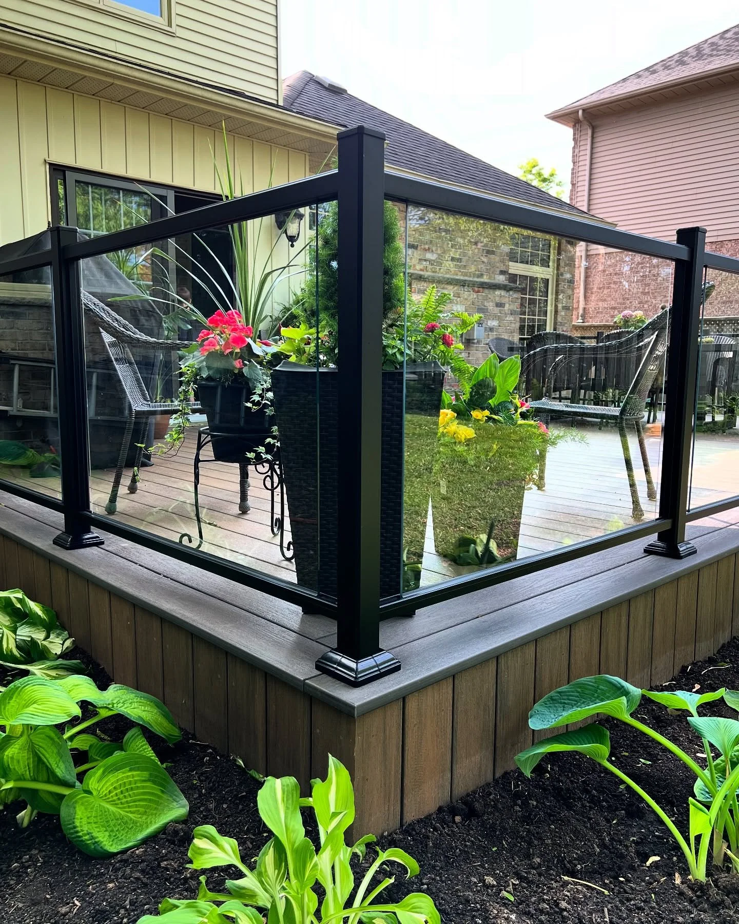 Just wrapped up this beautiful custom deck build featuring Amberwood and Black Walnut decking from Wolf Home Products, supplied by the always reliable team at Al-Mar Vinyl. 

Topped it off with a sleek glass and aluminum railing &mdash; also from Al-