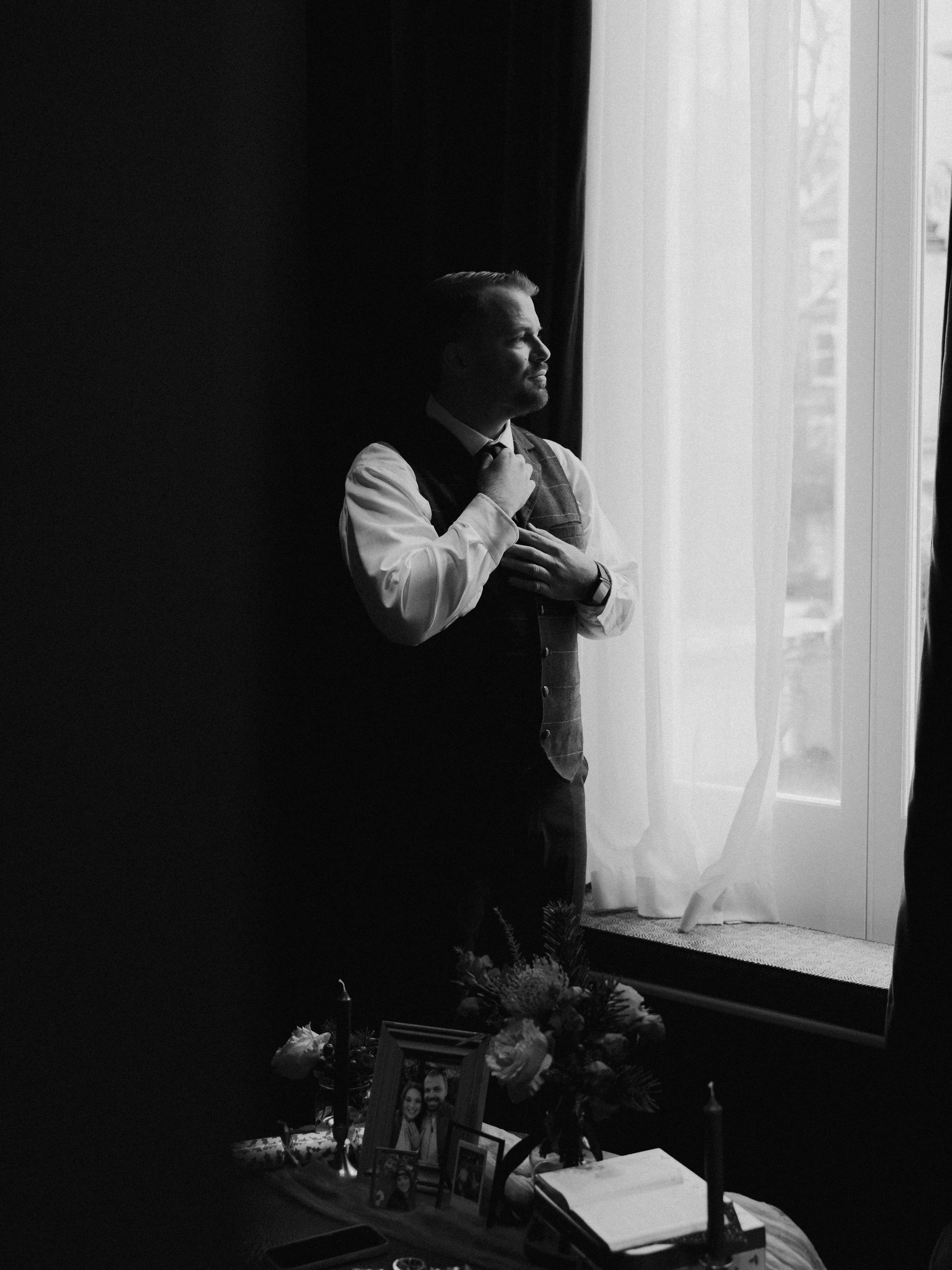 Groom getting ready ahead of his London elopement.
