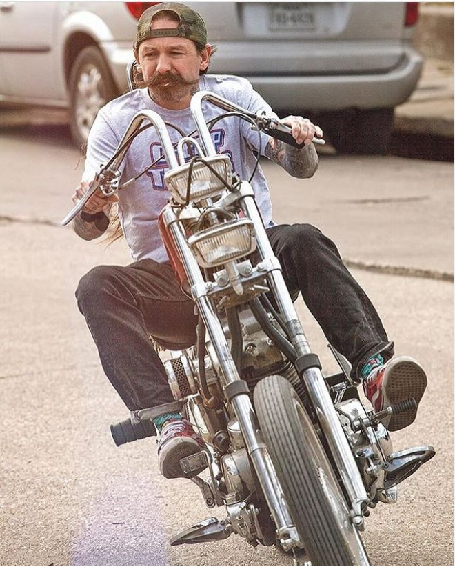 Oliver on motorcycle.png