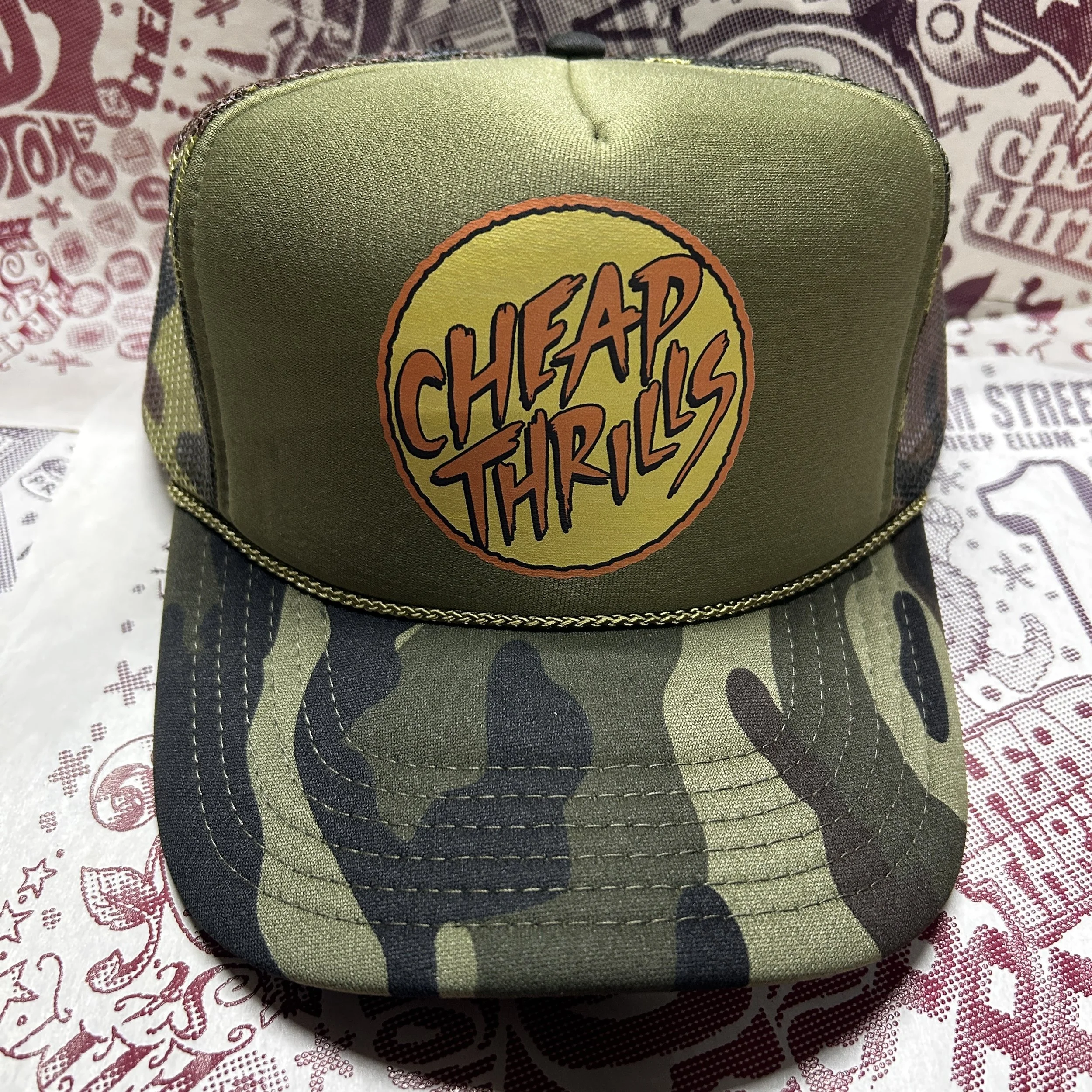 Cheap Thrills Orange Circle Logo Graphic Printed Camo Trucker Hat