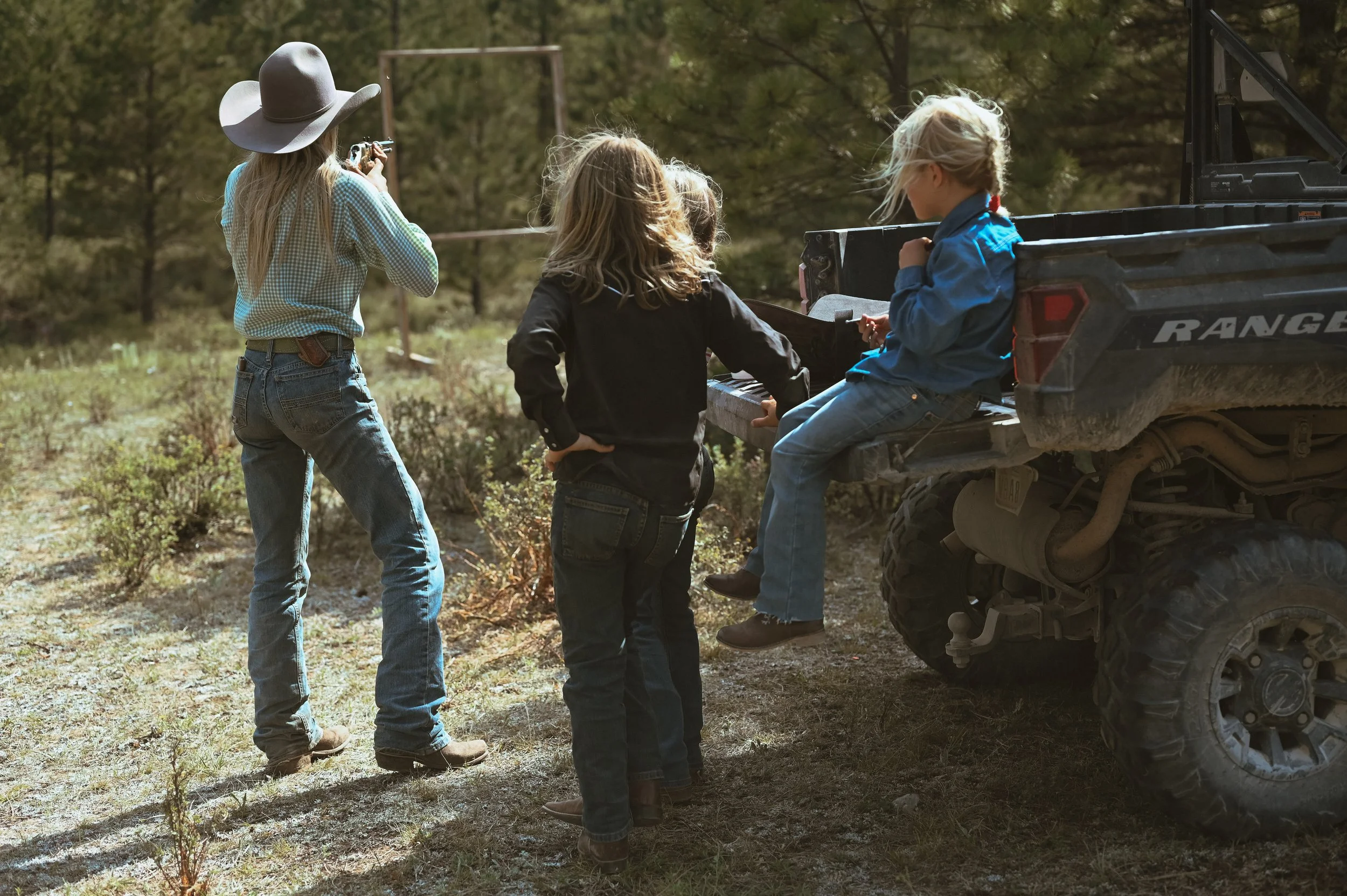 Dude Ranch guests are given instructions for sport shooting.