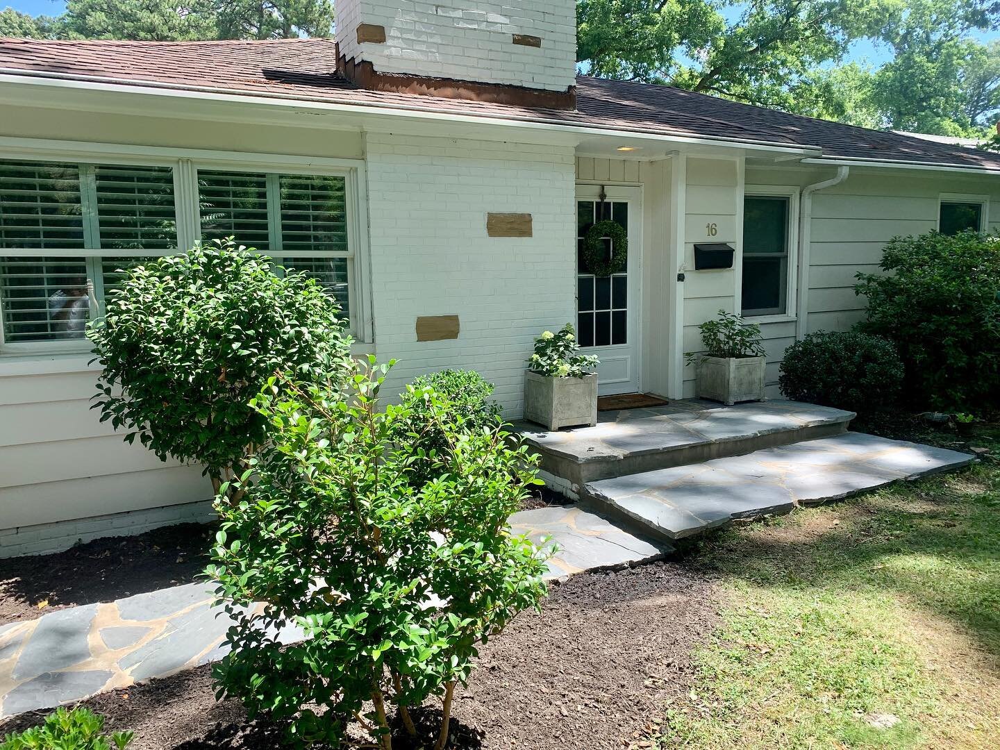 Increased some curb appeal this week with an irregular flag stone overlay. This front entrance makes a statement now.