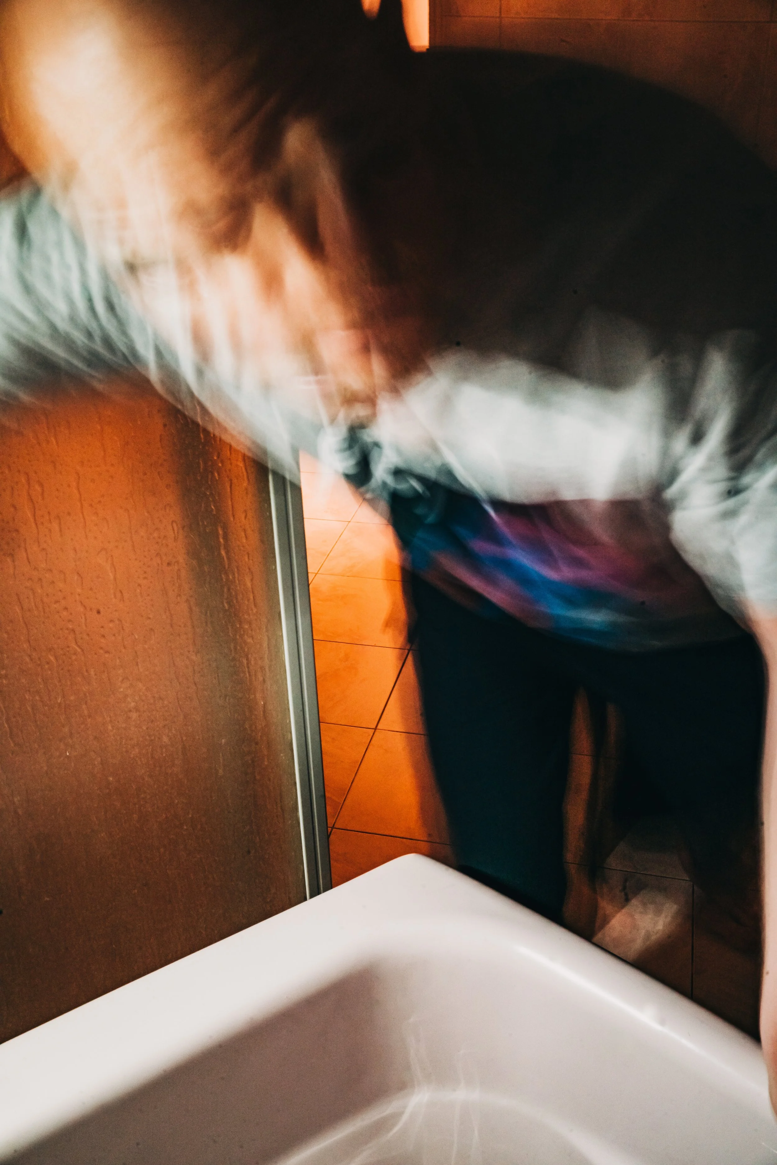 "Bathroom Guy" from "The Procrastinator" series. 2025.
Long exposure shot using house lighting and phone torchlight.