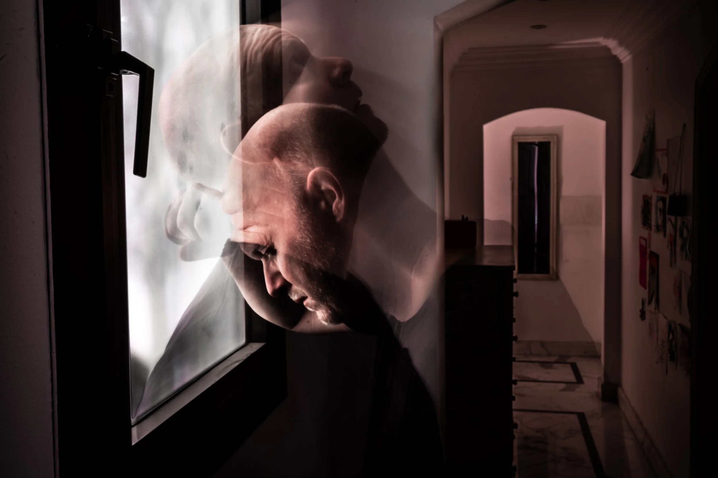 "Corridor of Despair" from "The Procrastinator" series. 2025.  
Long exposure using combination of natural and house lighting.