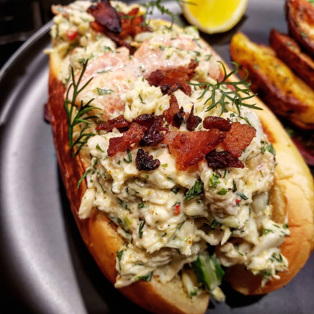 Spring🌱☀️ has sprung which means summer is near and that makes me think of LOBSTAH! 🦞 After my partner and I had some R&amp;R in southern NE I came back wanting more seafood. 

Toasted Martin's potato roll filled with a fresh herby mix of crab and 