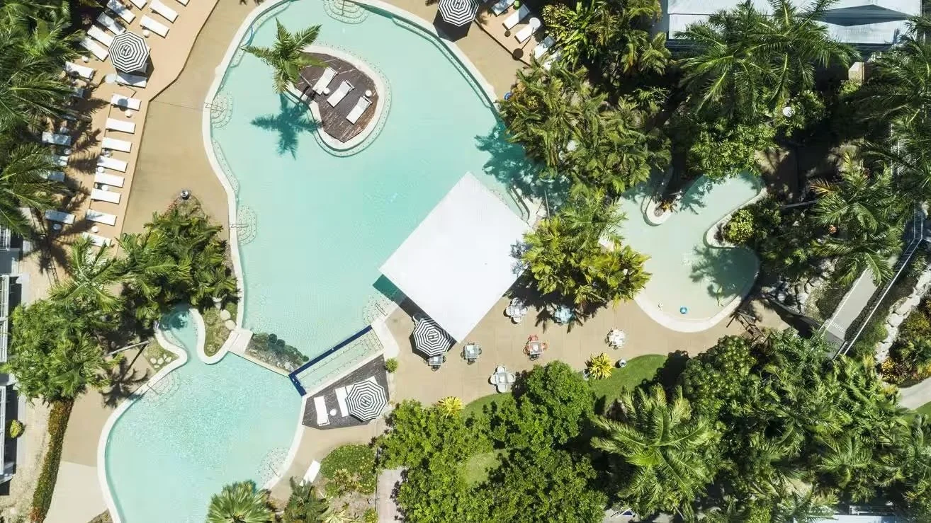 oaks-port-douglas-resort-pool-view-aerial-lap-pool-trees-1920x1080.jpg