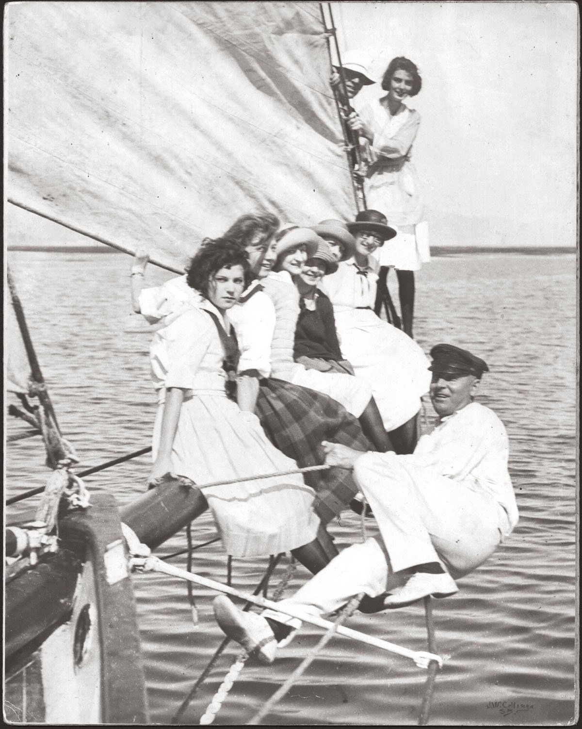  Club members cruise aboard the  Caprice  with Commodore Ed Gourley in the early 1920s. 