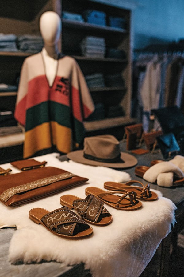  The Sagunto slides and Faraday sandals are among the store’s signature line of offerings. 