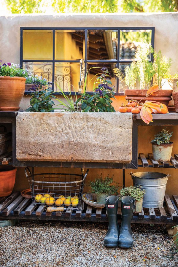 A large outdoor sink is a convenient spot for repotting plants and harvesting fruit.&nbsp; 