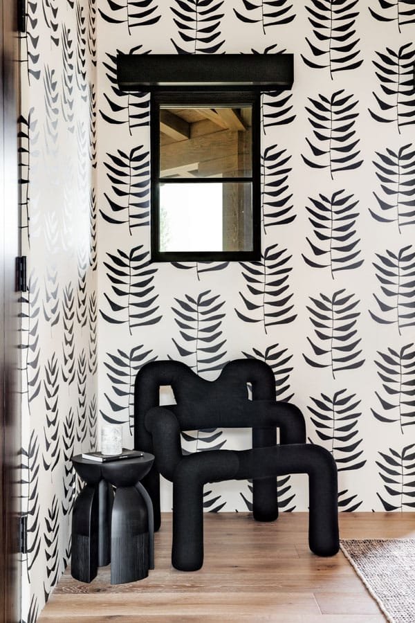  In the office, an eye-catching chair from Forom is paired with a side table from Garde. 