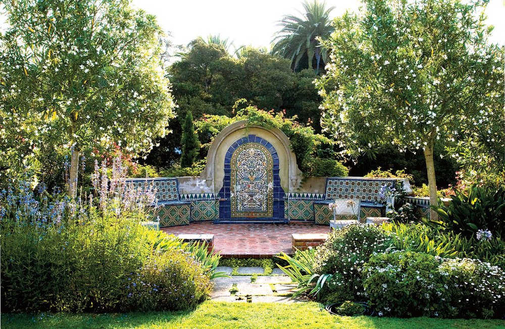  Colorful tiles abound, inside and in the blue-and-white garden. 