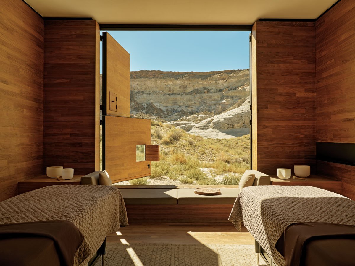  Spa treatment rooms engage directly with views of Canyon Point via large hinged wooden doors. 