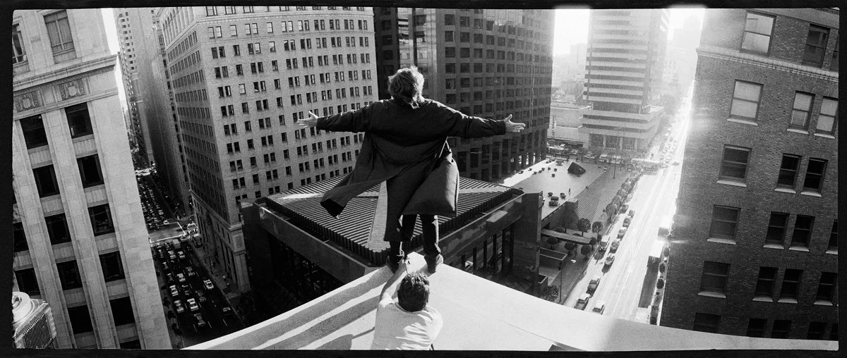  Stunt actor Gilbert Combs is steadied on a roof in  Fearless  in 1993. 