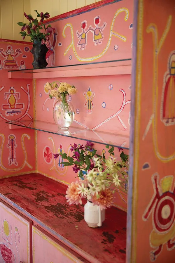  The laundry room boasts colorful storage by Ojai artist Beatrice Wood and flower arrangements by Amalgam Flora. 