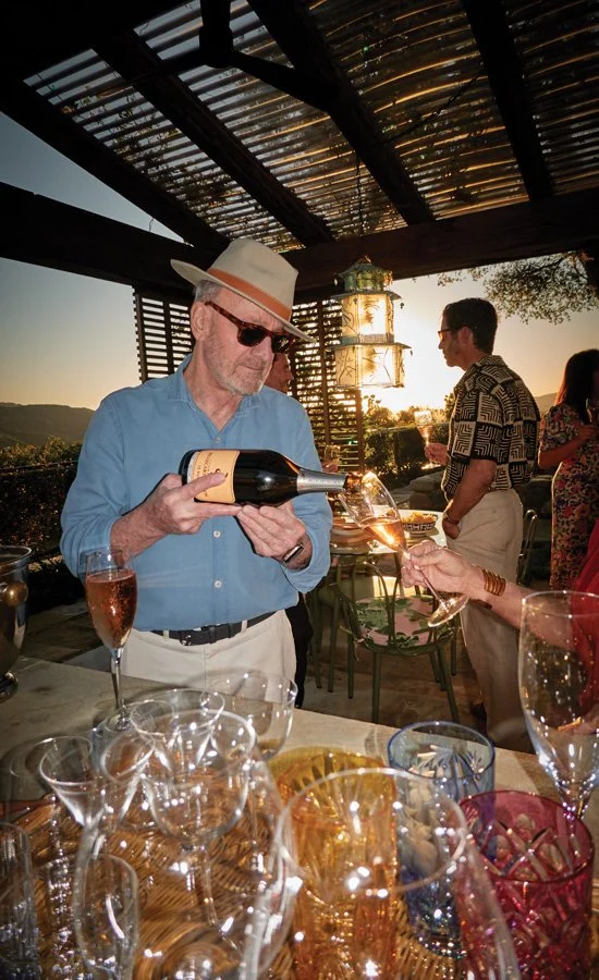  &nbsp;DeZonia pours bubbly in the gazebo 