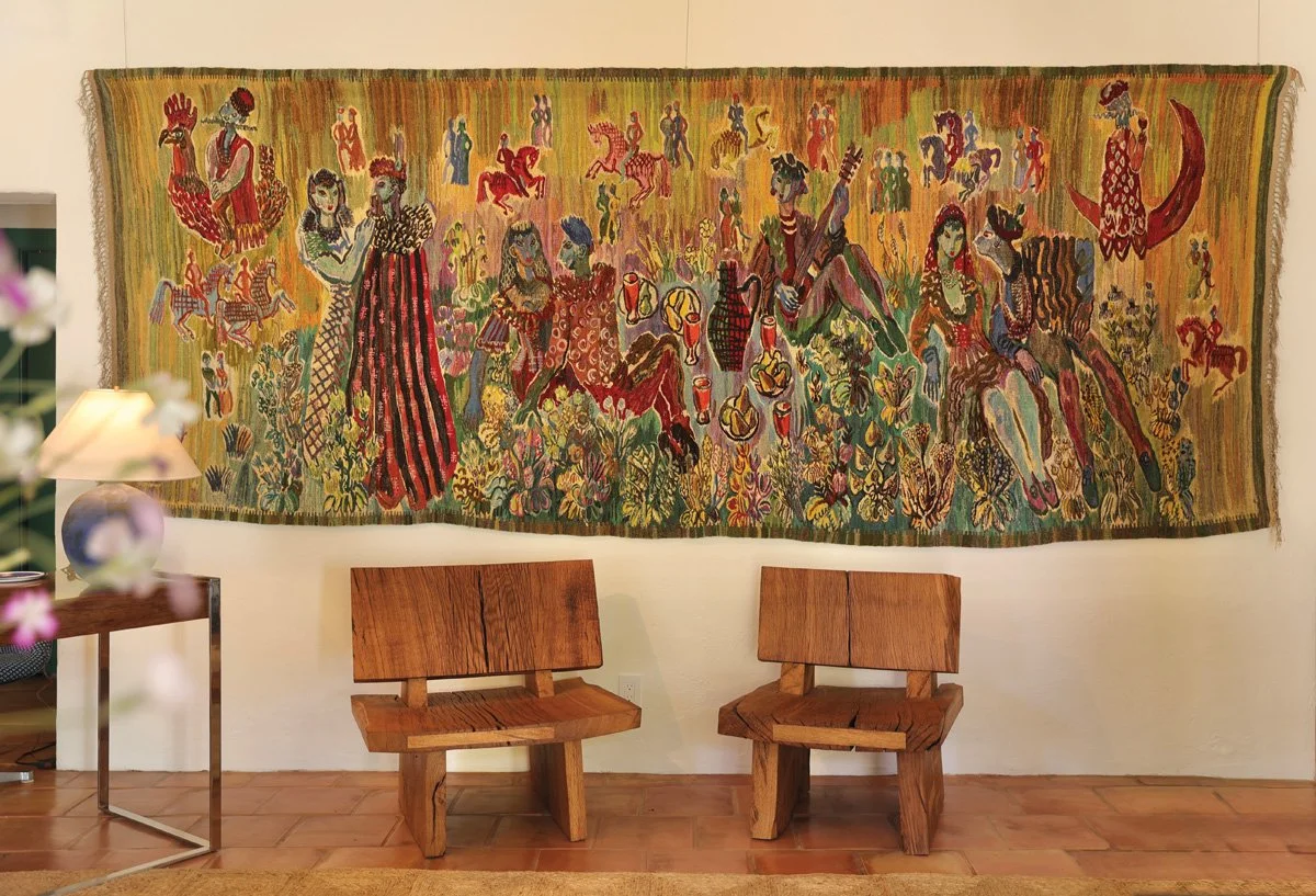  Chet Taylor’s oak chairs beneath a handwoven tapestry by Stefan and Helena Galkowski 