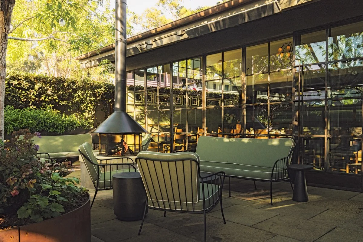  Patio dining with a fireplace 