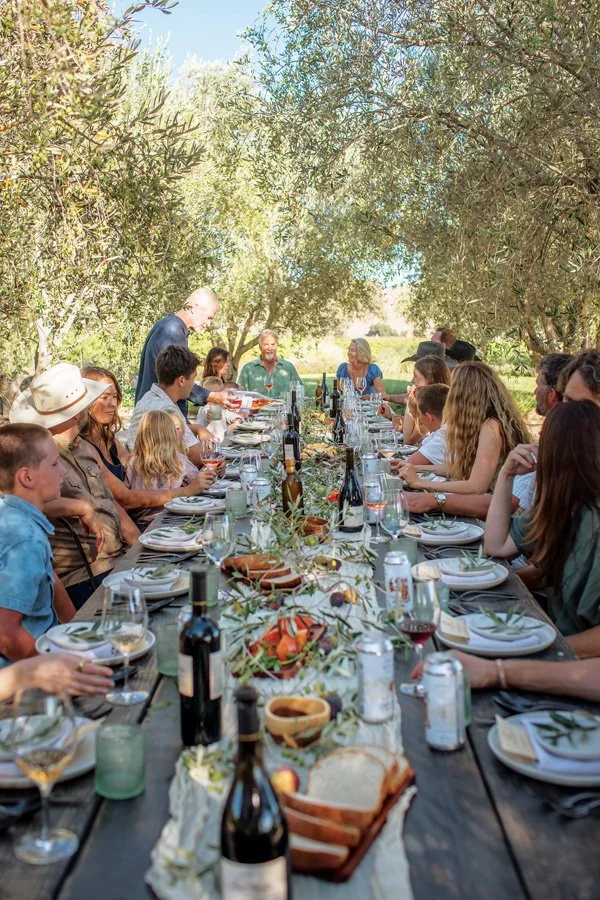  Four generations of the Parker family gather for an alfresco feast. 