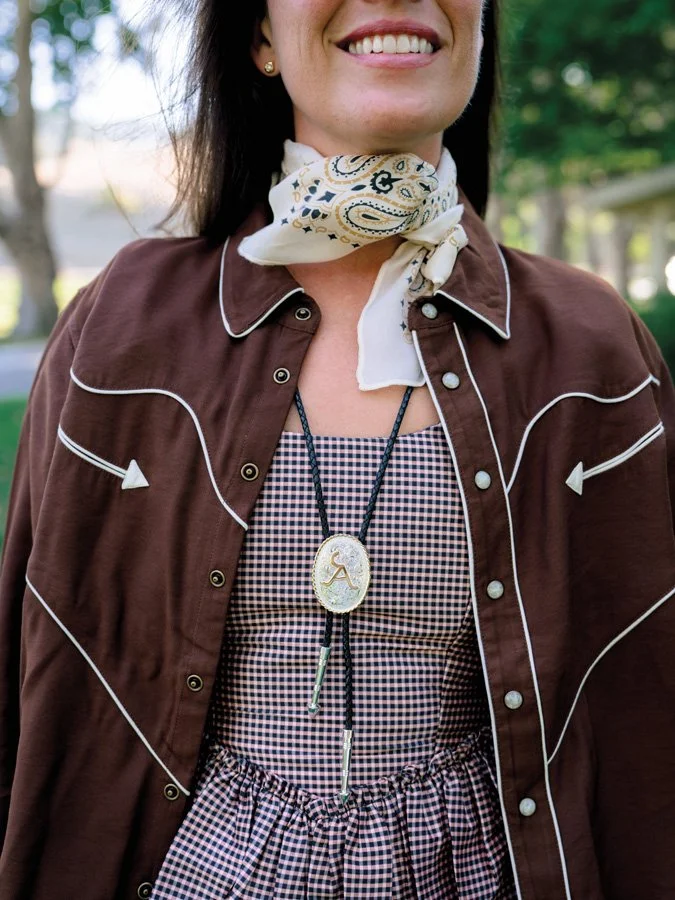  Western Shirt, $395; Silk Bandana, $65; Silver Bolo Tie, $110  thisisthegreat.com  