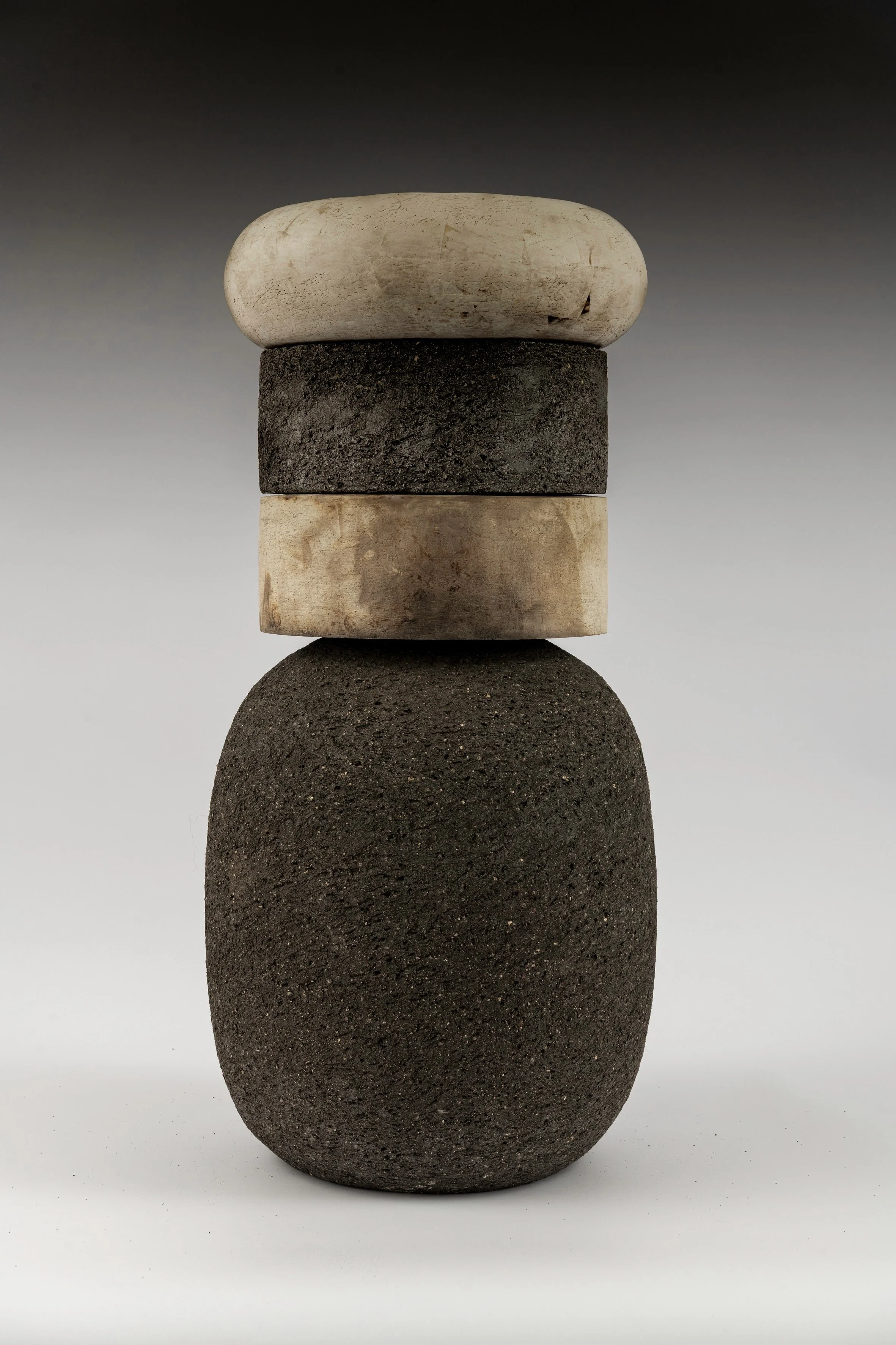 Totem I 
composite stacked piece
Handcoiled ceramic (smoke fired)
2026

image by Pete Stone