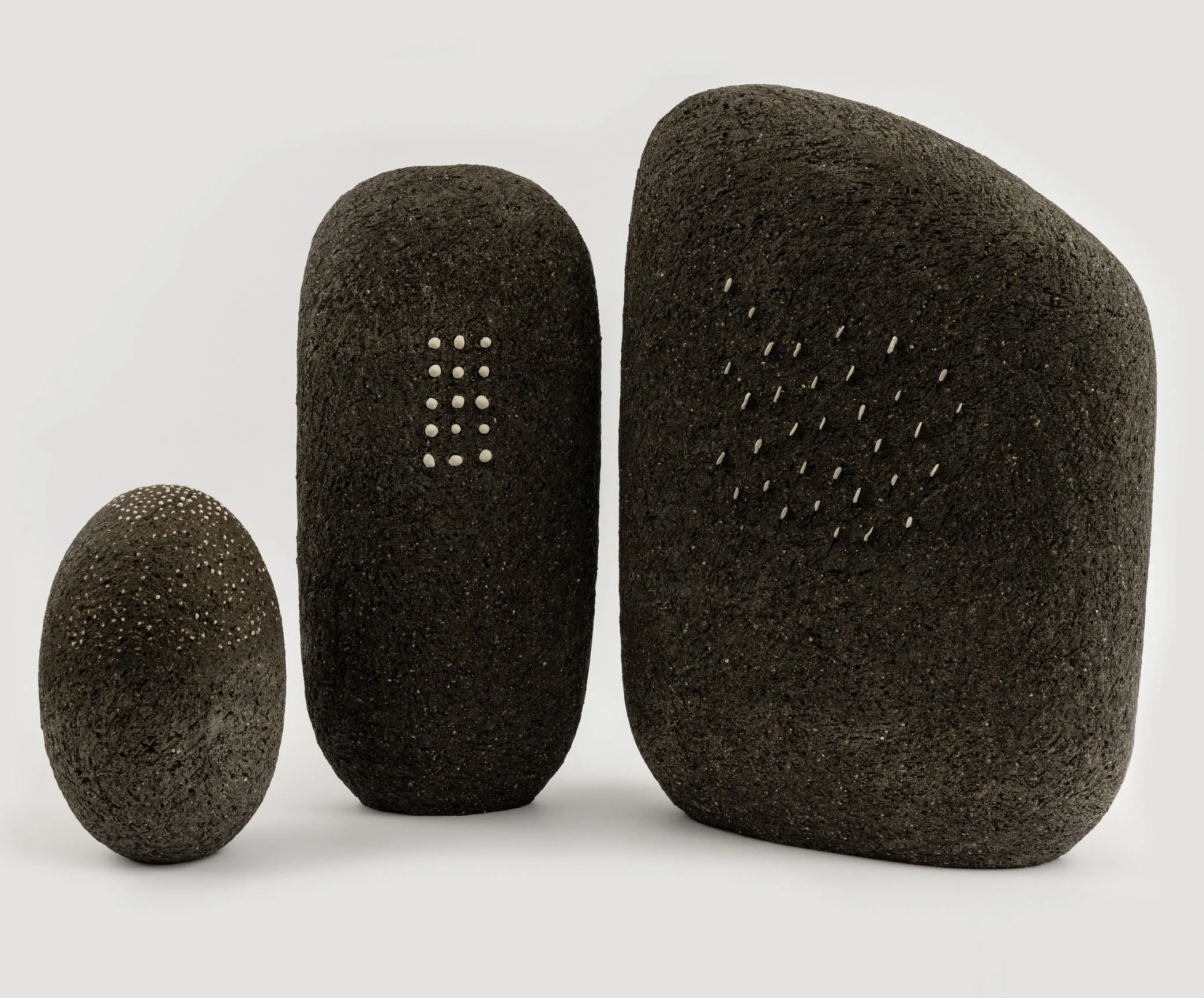 Menhirs (after Orkney) (height 20cm - 45cm) 
Hand coiled ceramic with inset porcelain.  Earthenware.
AVAILABLE