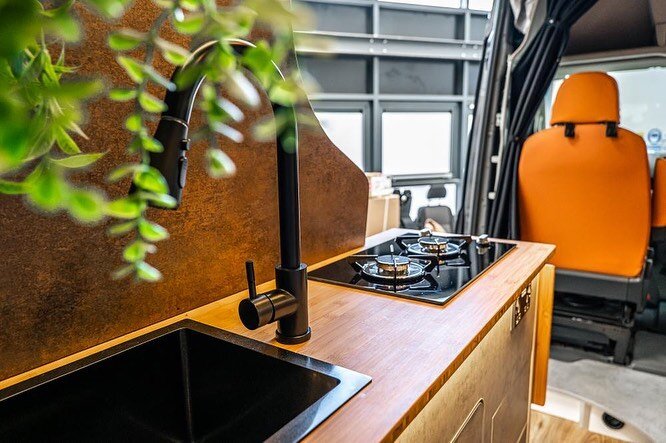 Possibly our favourite kitchen design yet. Morning coffee with a view is what we&rsquo;re living for right now. (Psssssssst this van is bookable - click hire the juggernaut in our bio) 
Where&rsquo;s everyone&rsquo;s adventures taking them this bank 