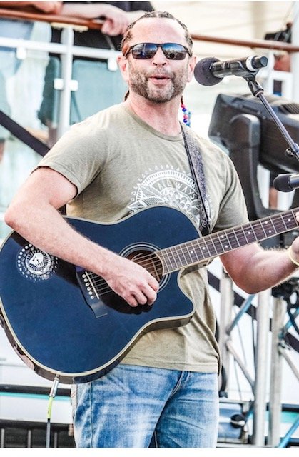 Late Friday + Live Music with Tristan Adams