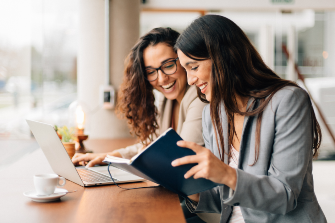 Two Girls working at laptop