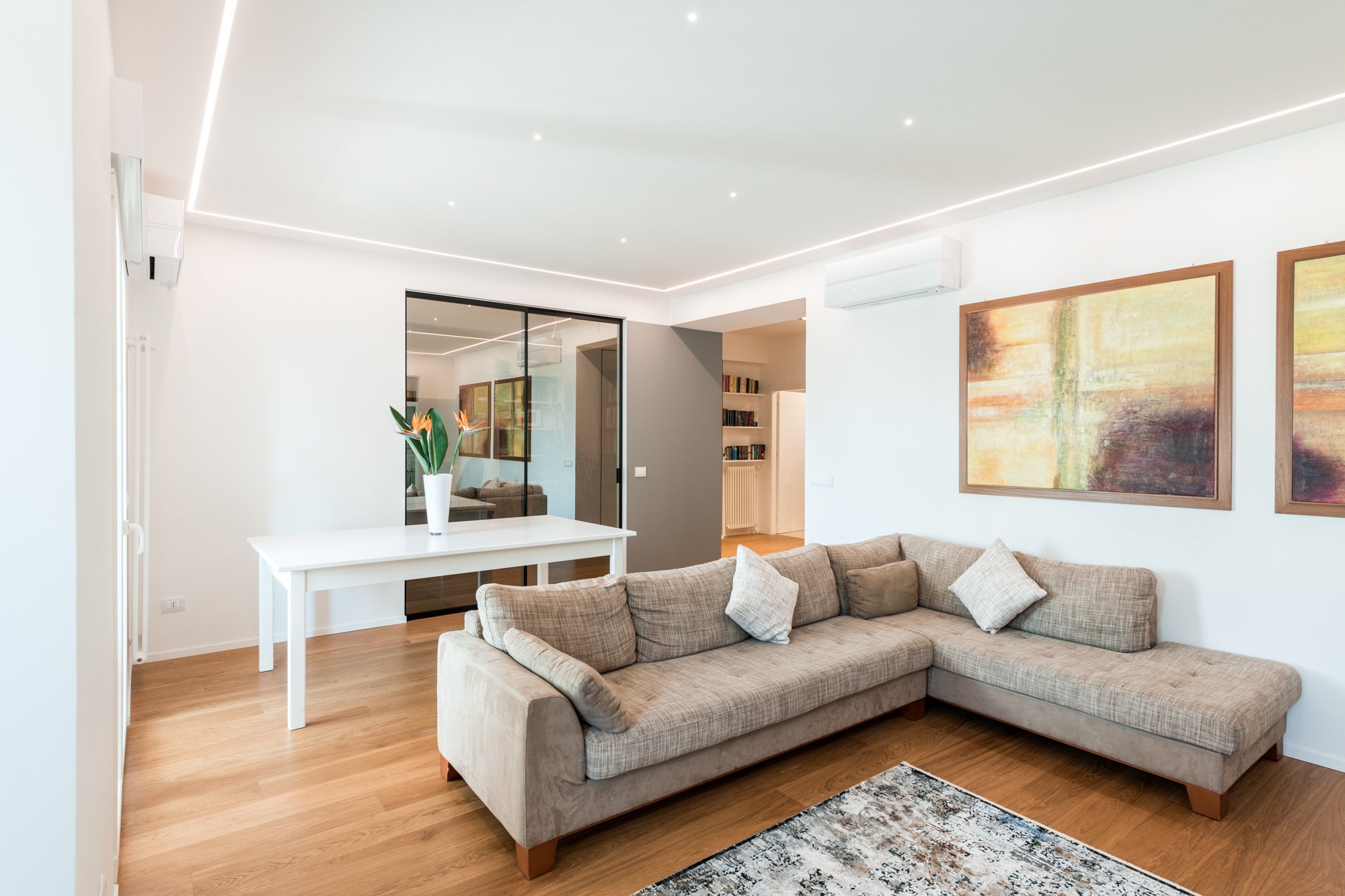 zona-giorno-studio-porta-vetro-appartamento-mikado-palermo.jpg