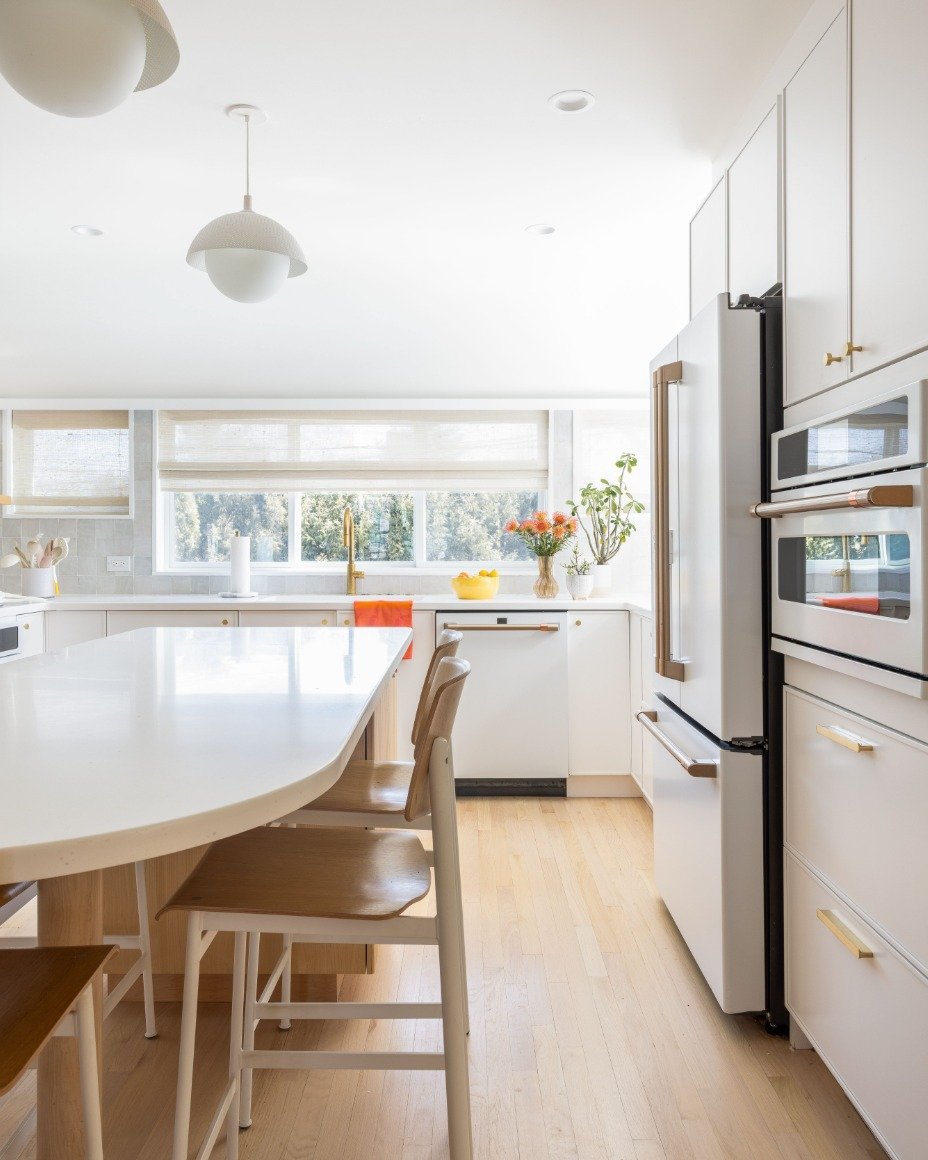 The hub of this home is a hard-working kitchen - balancing between calm when needed for that first cup of morning coffee and chaos that ensues when all members of the family get ready to start their day - still maintaining ample room for all activiti