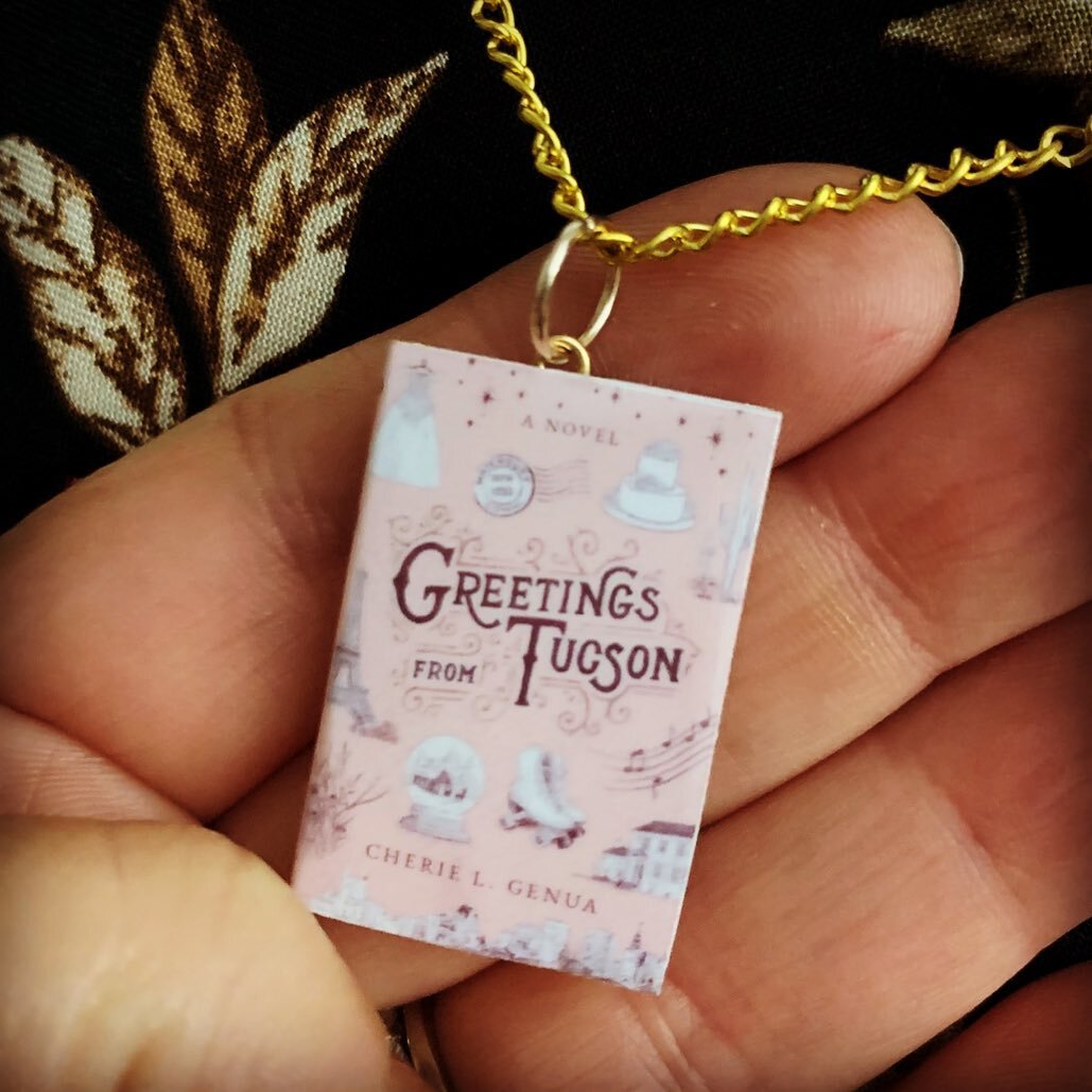 Can you even?! 😍😍 admiring this beautiful and thoughtful book charm my BFF gave me at the #greetingsfromtucson launch party. Such a special gift! 💕
