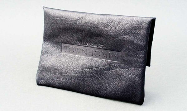 Debossed Logo Textured Leather Pouch.jpg