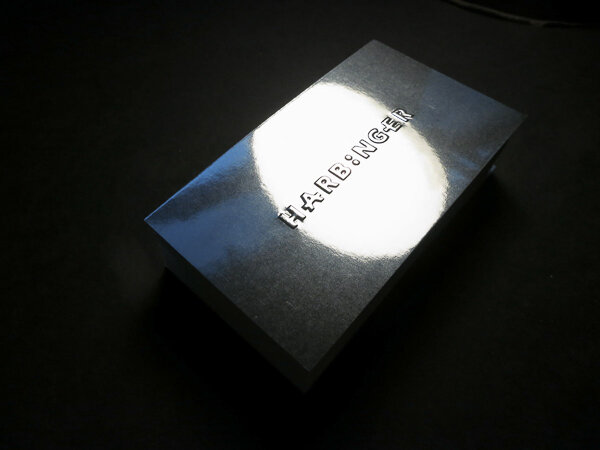 silver mirror business card embossed logo.jpg