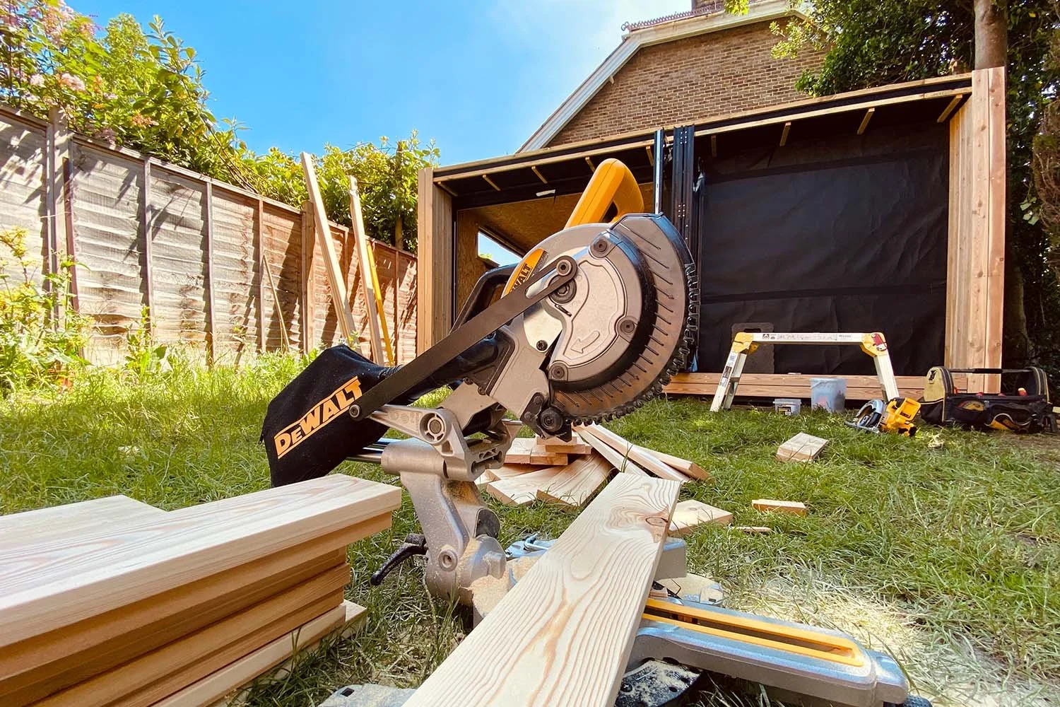 Professional garden room construction in the UK showing timber build and installation process
