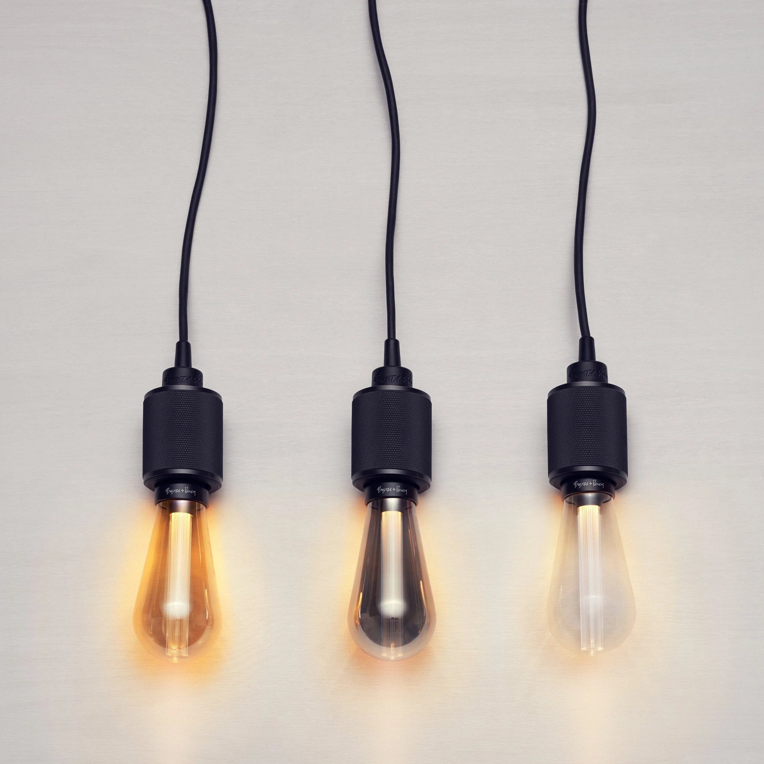 Optional Buster + Punch light fittings shown as a premium lighting upgrade for our garden rooms