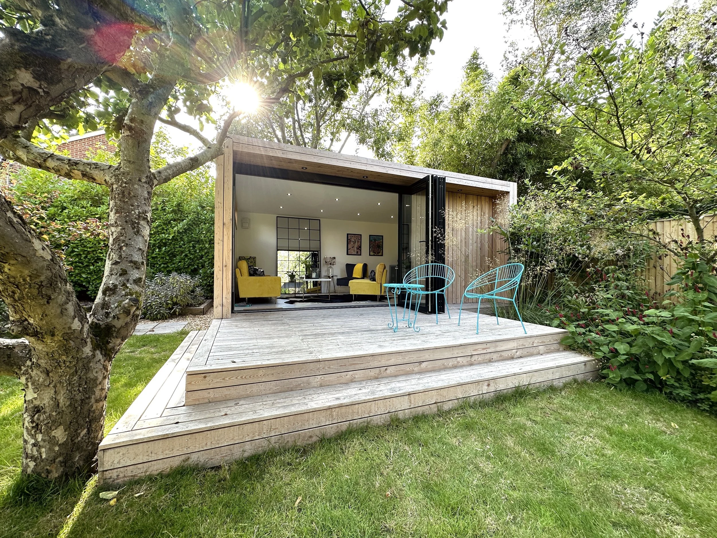Garden room with front decking and outdoor seating, designed for flexible everyday use