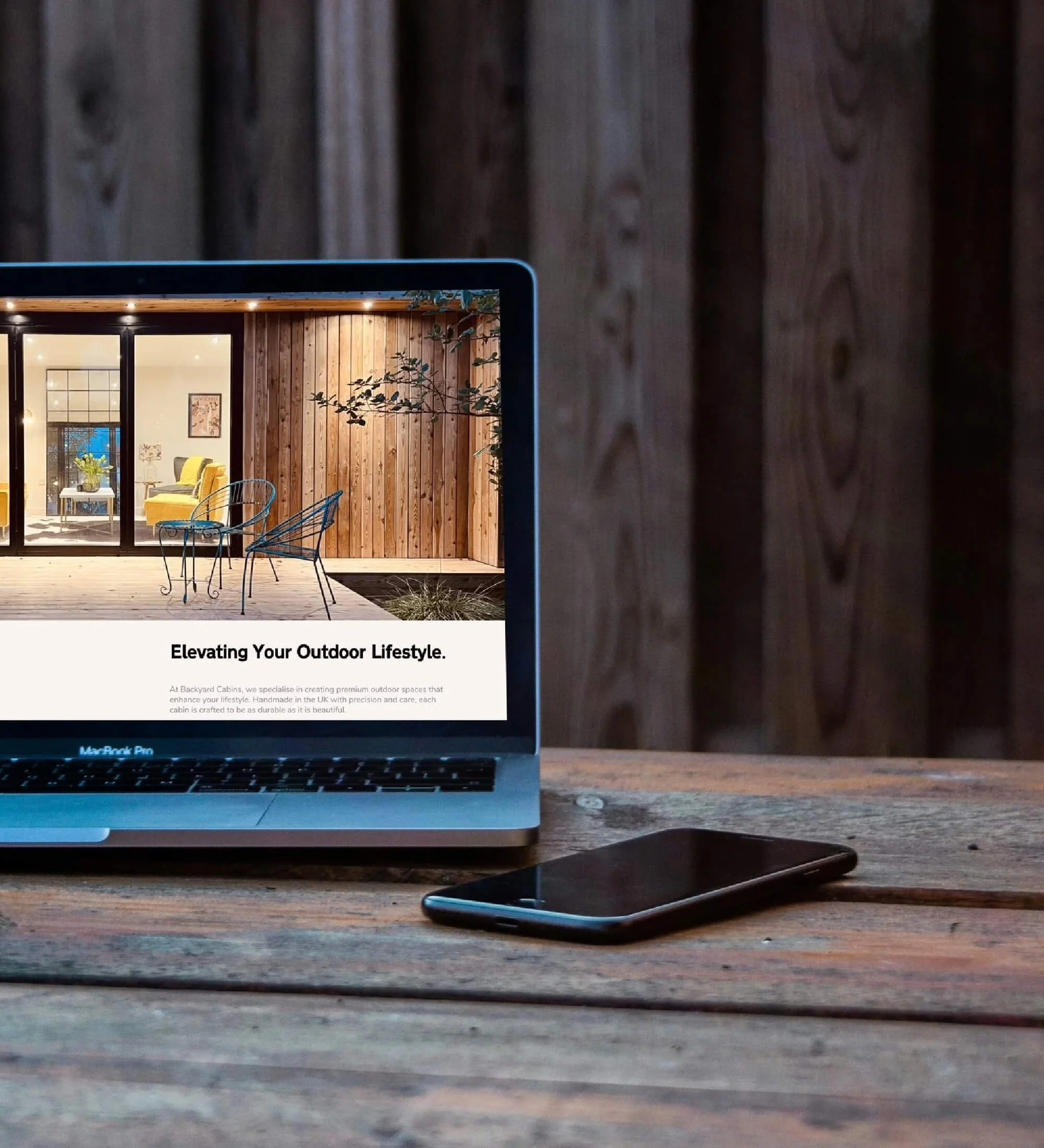 Garden room brochure displayed on a laptop, showcasing modern garden room design and inspiration