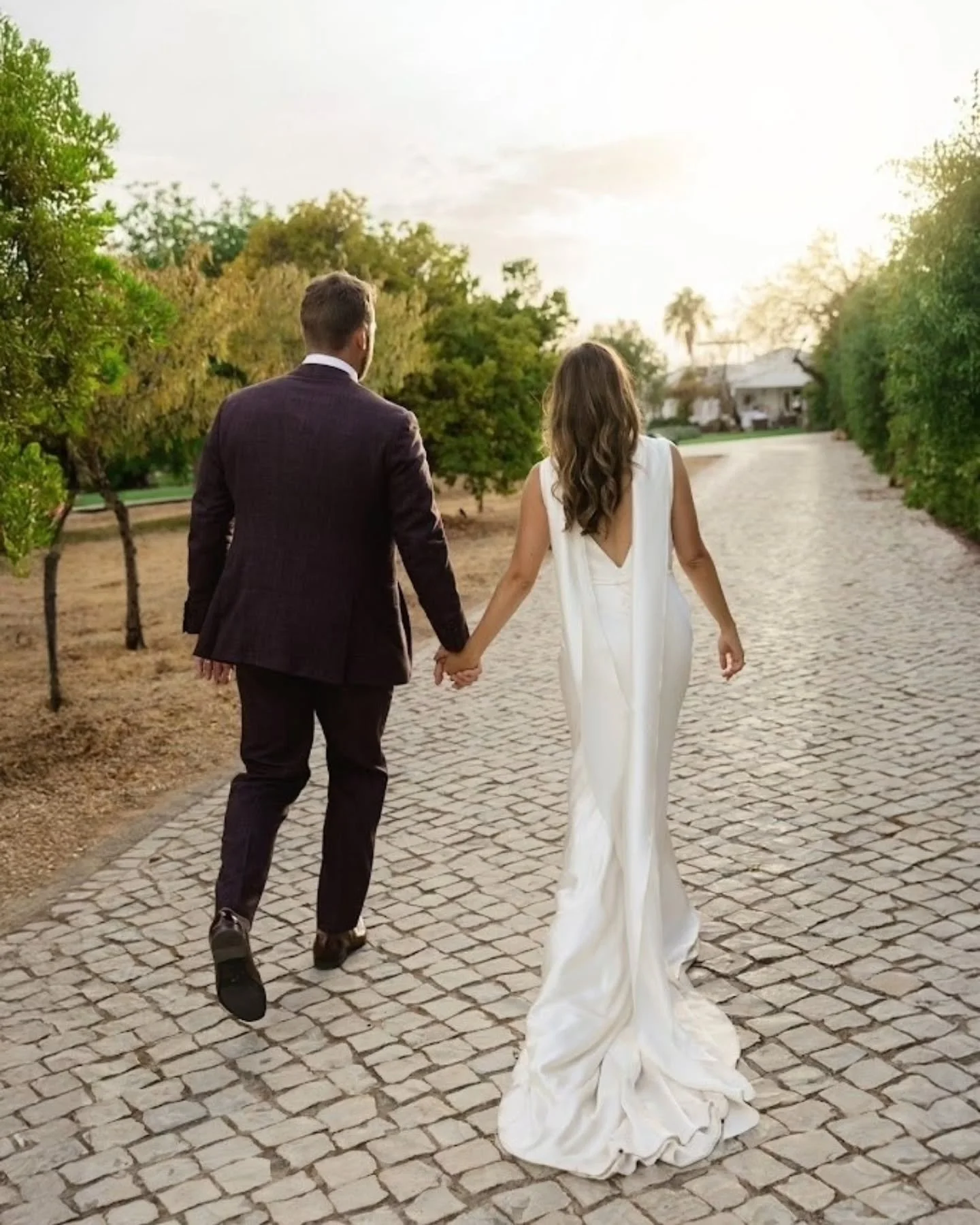 Eva wears The Faith Dress. Bias-cut 100% silk with a plunge neckline, low back, and epic train. Eva ordered her dress in Belgium at our wonderful stockist @september___bridal, and also requested a bespoke matching satin scarf. Stunning.
Photos by @ma