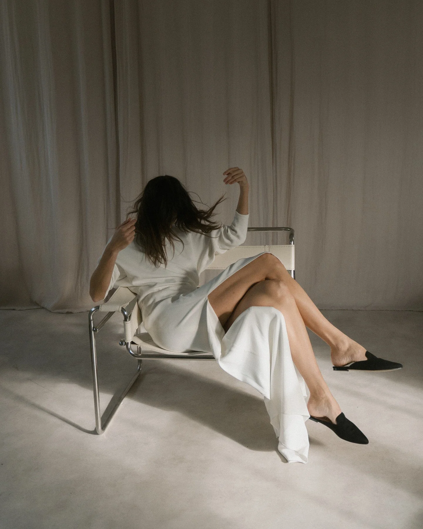 Meet the Nejire Dress. Sculptural, chic, and contemporary &mdash; cut from luxurious matte Italian cr&ecirc;pe and inspired by the innovative work of fashion cutter Tomoko Nakamichi. The bodice and sleeves are formed from a single piece of fabric, ex