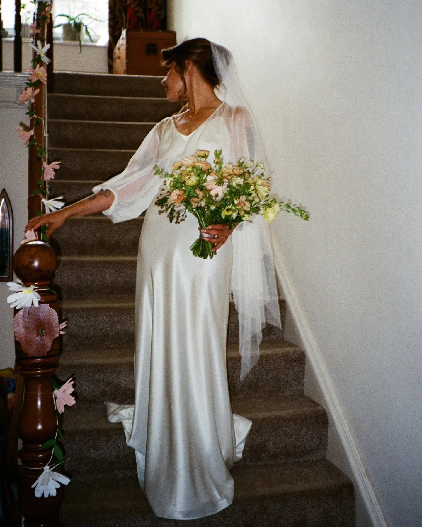 Beautiful Ciska in her personalised Rolling In Roses ensemble. Ciska fell in love with our Euphoria Blouse, but requested it in soft sheer chiffon instead of silk satin, so the detail of her dress could be glimpsed through it. We made Ciska a custom 