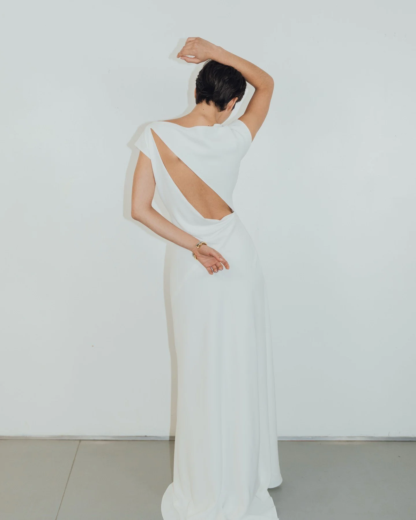The Odalisque Dress. A love letter to unconventional pattern drafting and delicate demi-couture dressmaking.
Crafted slowly and lovingly in our atelier in the heart of Yorkshire, this piece is a meticulously cut, fluidly draped dress of bias cr&ecirc