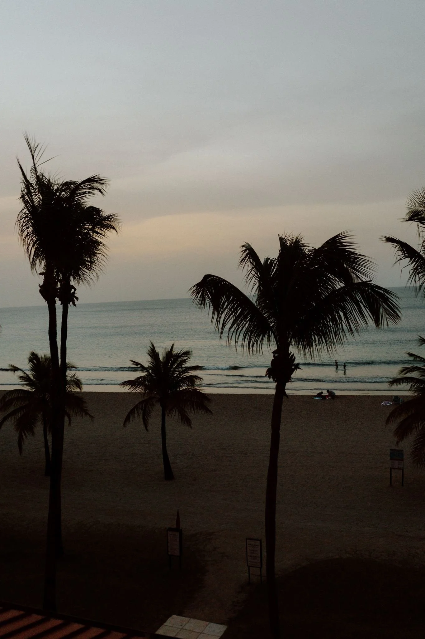 documentary style wedding photos on Isla verde beach in Carolina, PR. Bride and groom