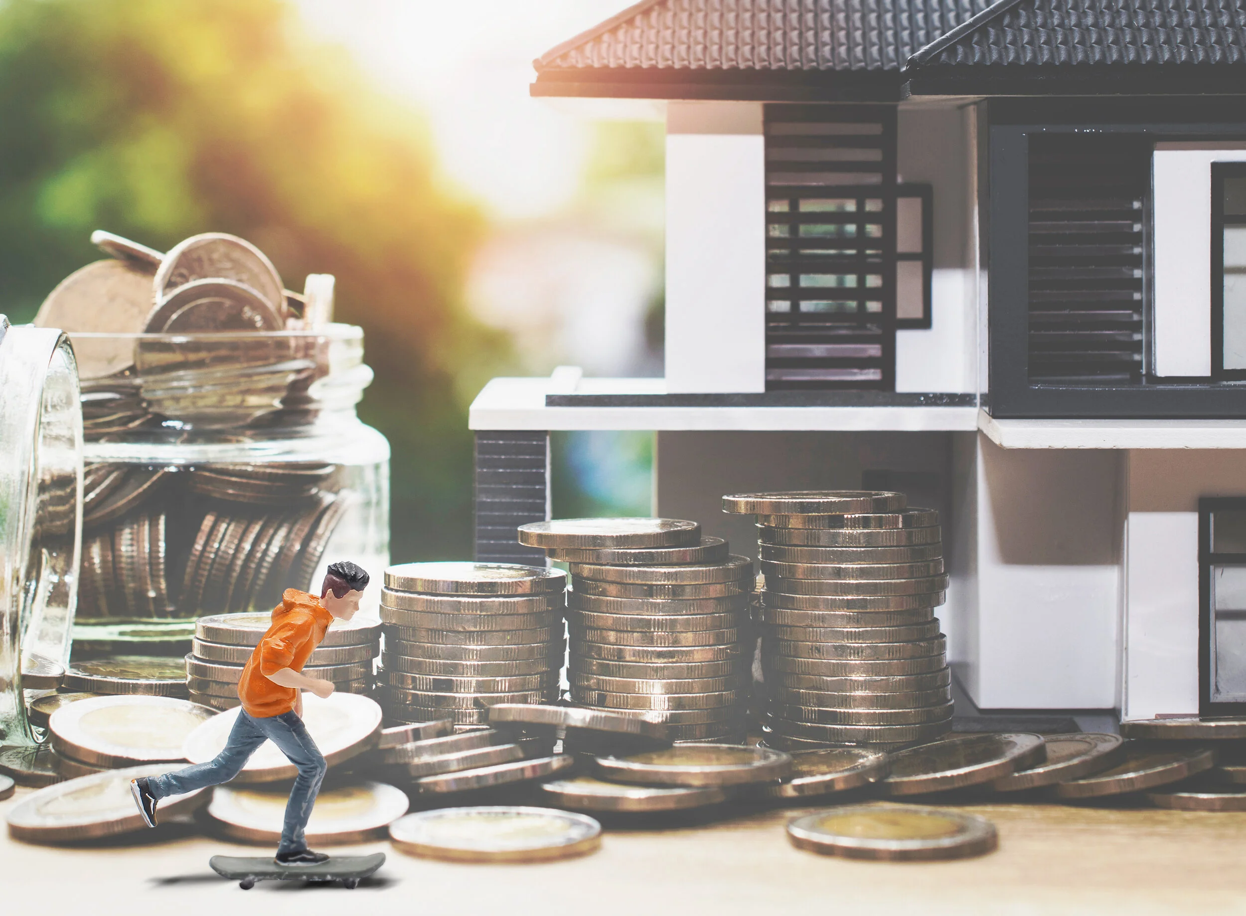 Bright natural dining room nook with vases plates and fruits on the table.