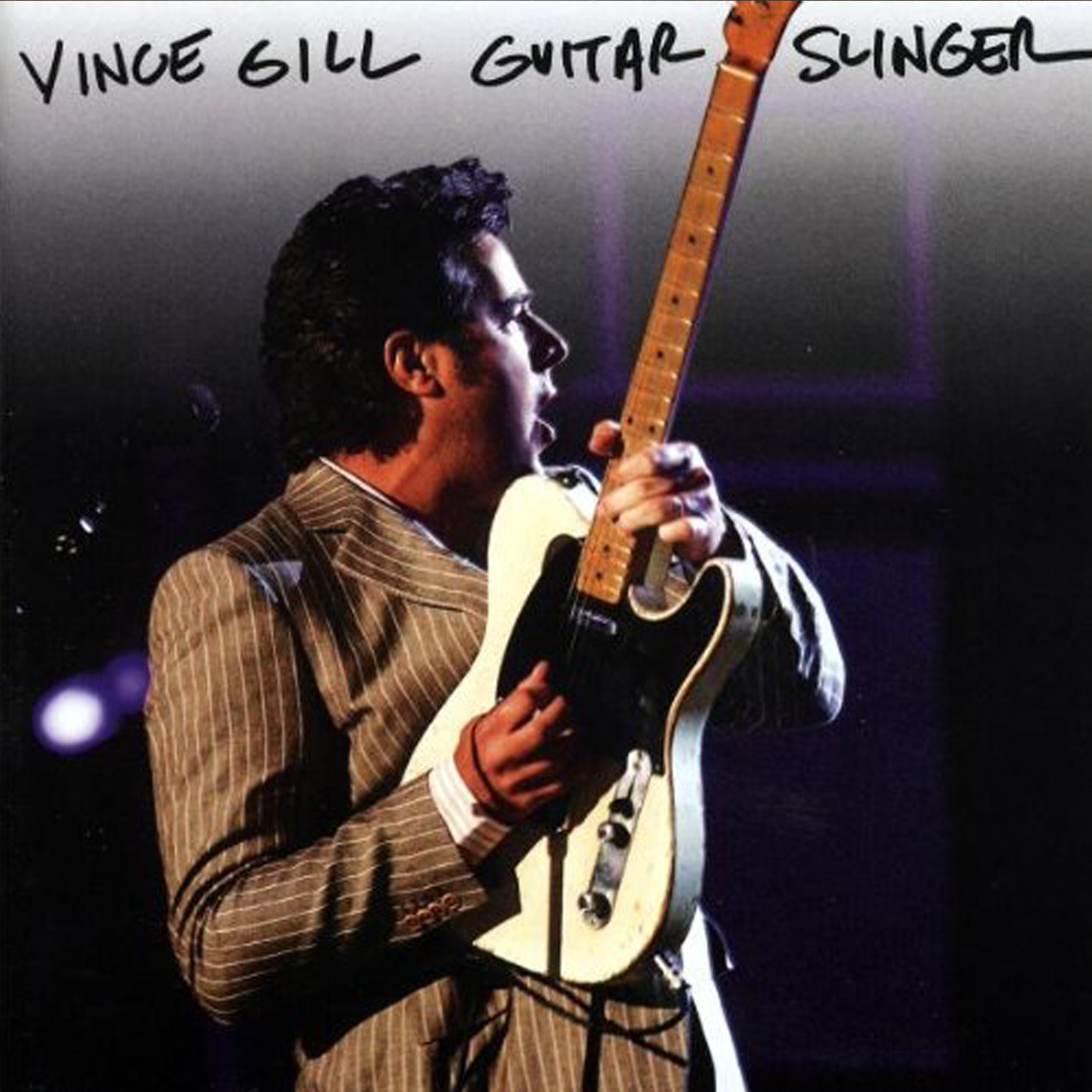 Vince Gill Guitar Slinger.jpg
