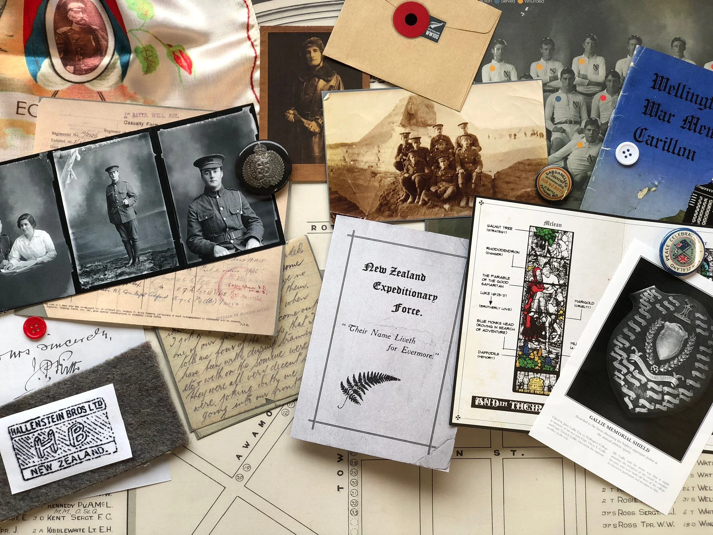 A collection of historical photographs, documents, buttons, and memorabilia related to New Zealand military history and explorers.