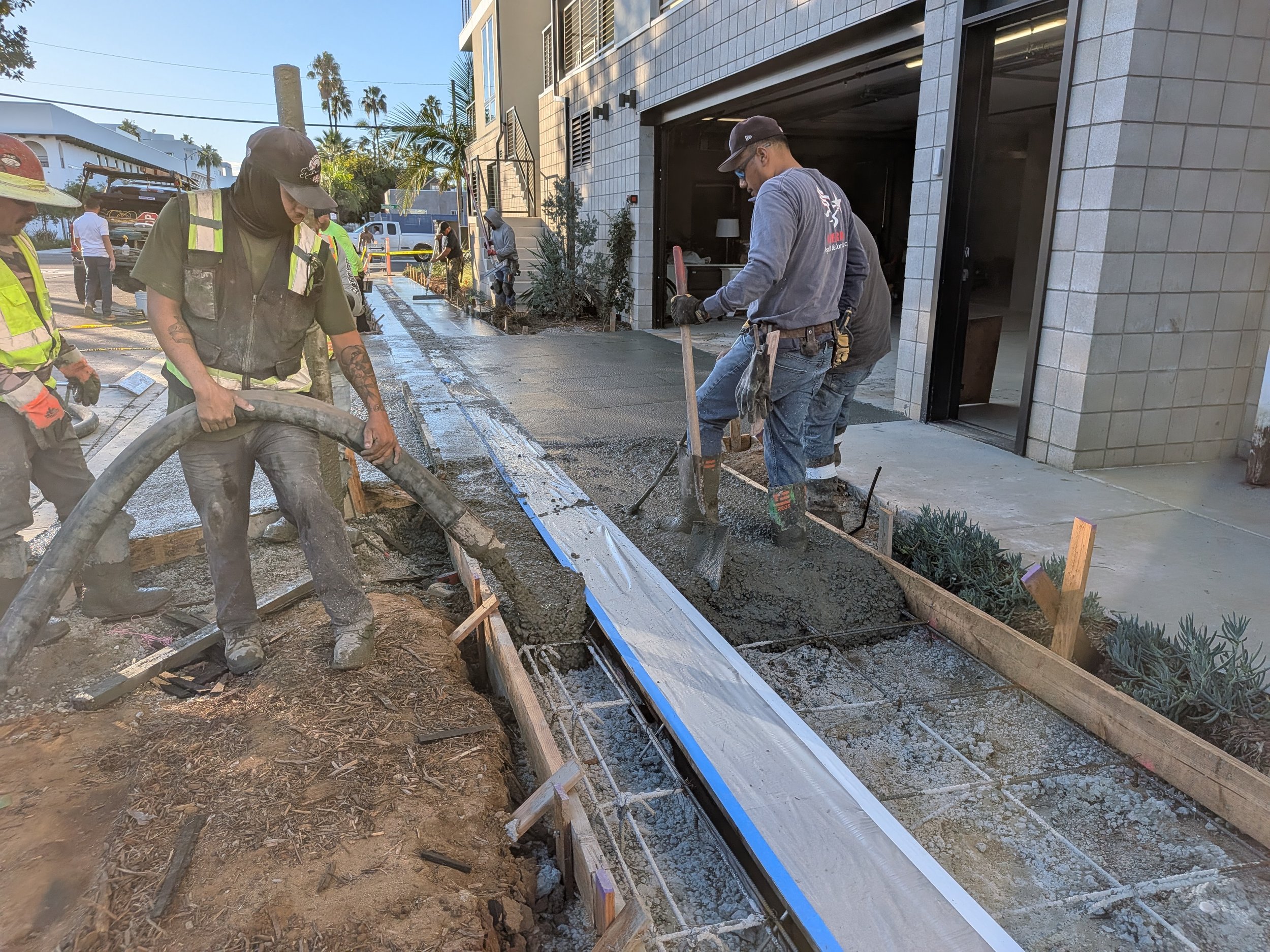 Workers Completing Right-of-Way work at Freeman Street Hmes