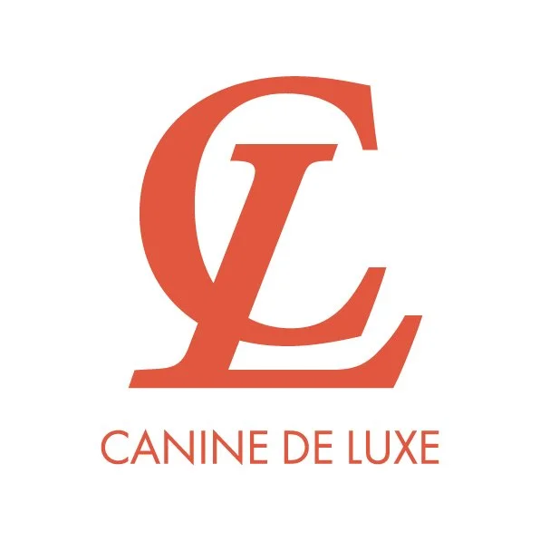 Logo with stylized letters 'C' and 'L' in orange, and the text 'Canine De Luxe' underneath.